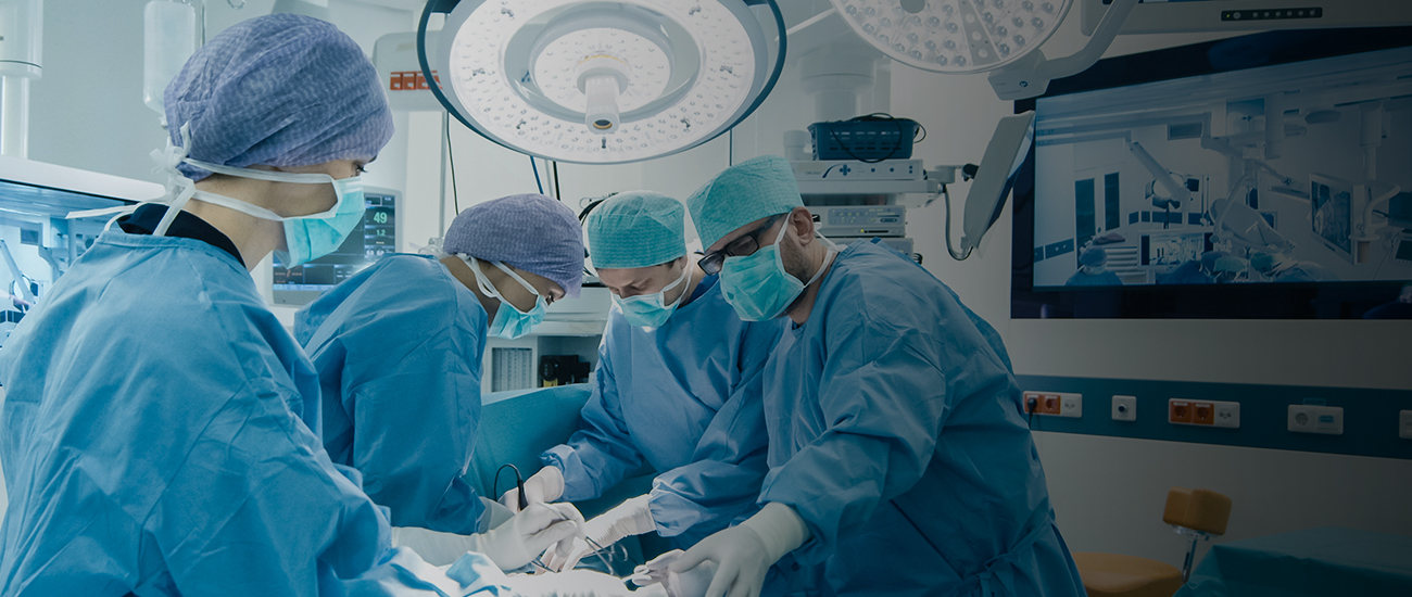 A group of skilled surgeons in an operating room